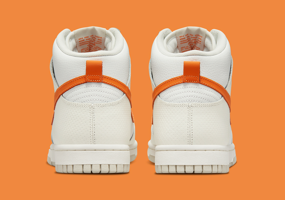 1647981040 704 Swooshes naranjas y superposiciones perforadas visten las ultimas Nike Dunk